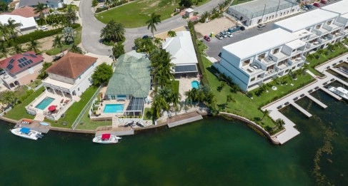 Gated Bimini Drive, Grand Harbour, Single Level 4 Bed Canal Front Home REDUCED!