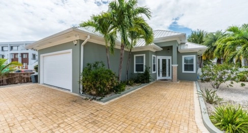 Gated Bimini Drive, Grand Harbour, Single Level 4 Bed Canal Front Home REDUCED!