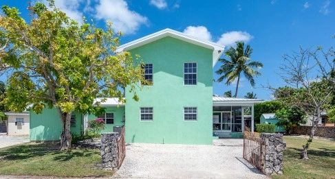 North Sound Estates Canal Front Family Oasis with Private Dock