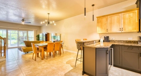 Rare Gem in George Town – Move-In Ready L'Ambience Town home with Den & Fruitful Backyard