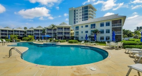CRESCENT POINT UNIT #14 | SEVEN MILE BEACH - Fully Remodeled, Turnkey & Income-Producing Opportunity